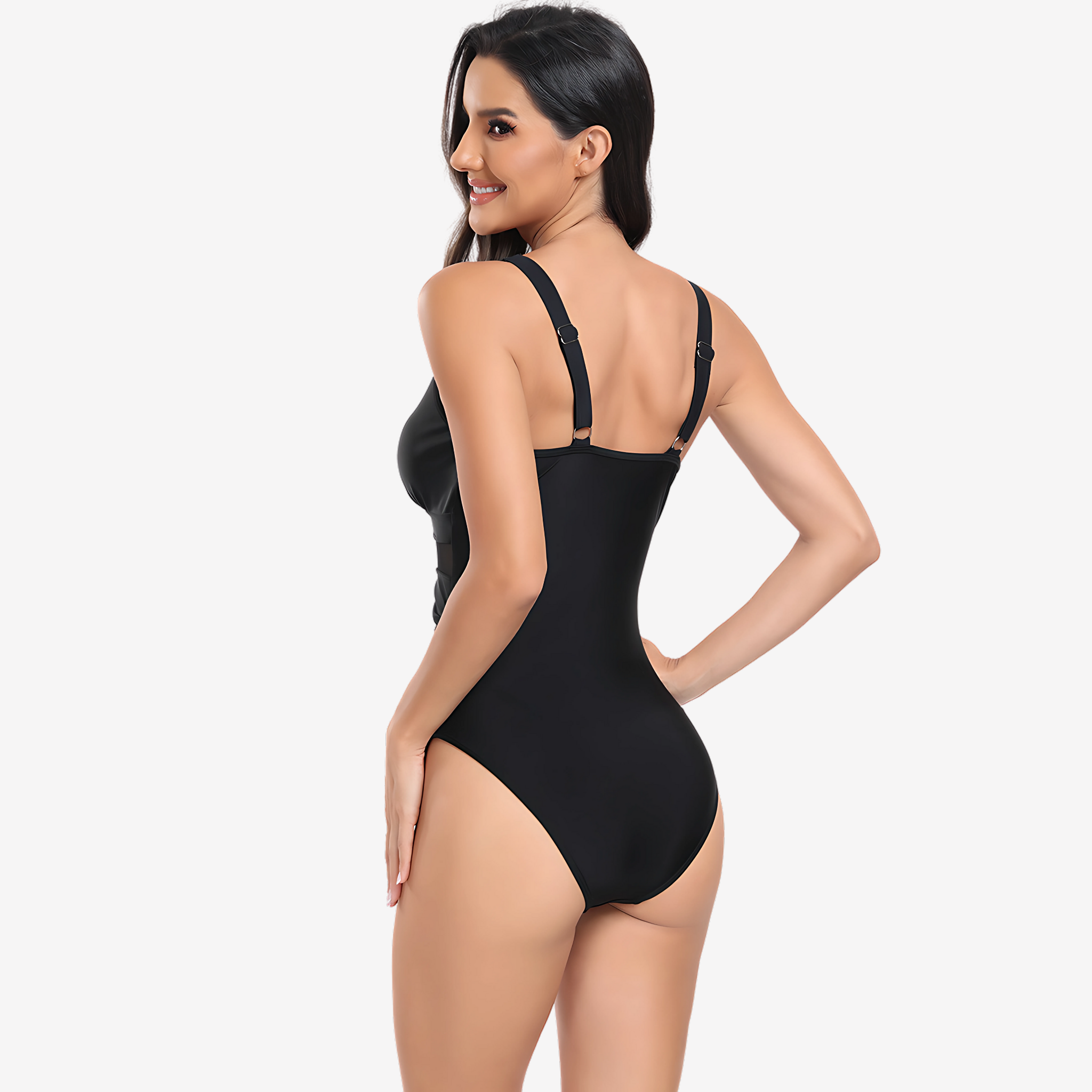 Back View of Model wearing a black luxury one-piece swimsuit with a sheer mesh waist and deep V neckline from Intyra’s designer collection.