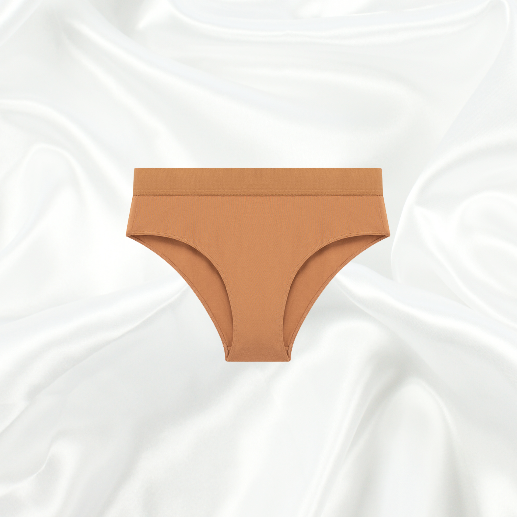 Intyra’s Beige Seamless Panty made from ultra-soft fabric, offering a smooth, invisible fit for all-day comfort.