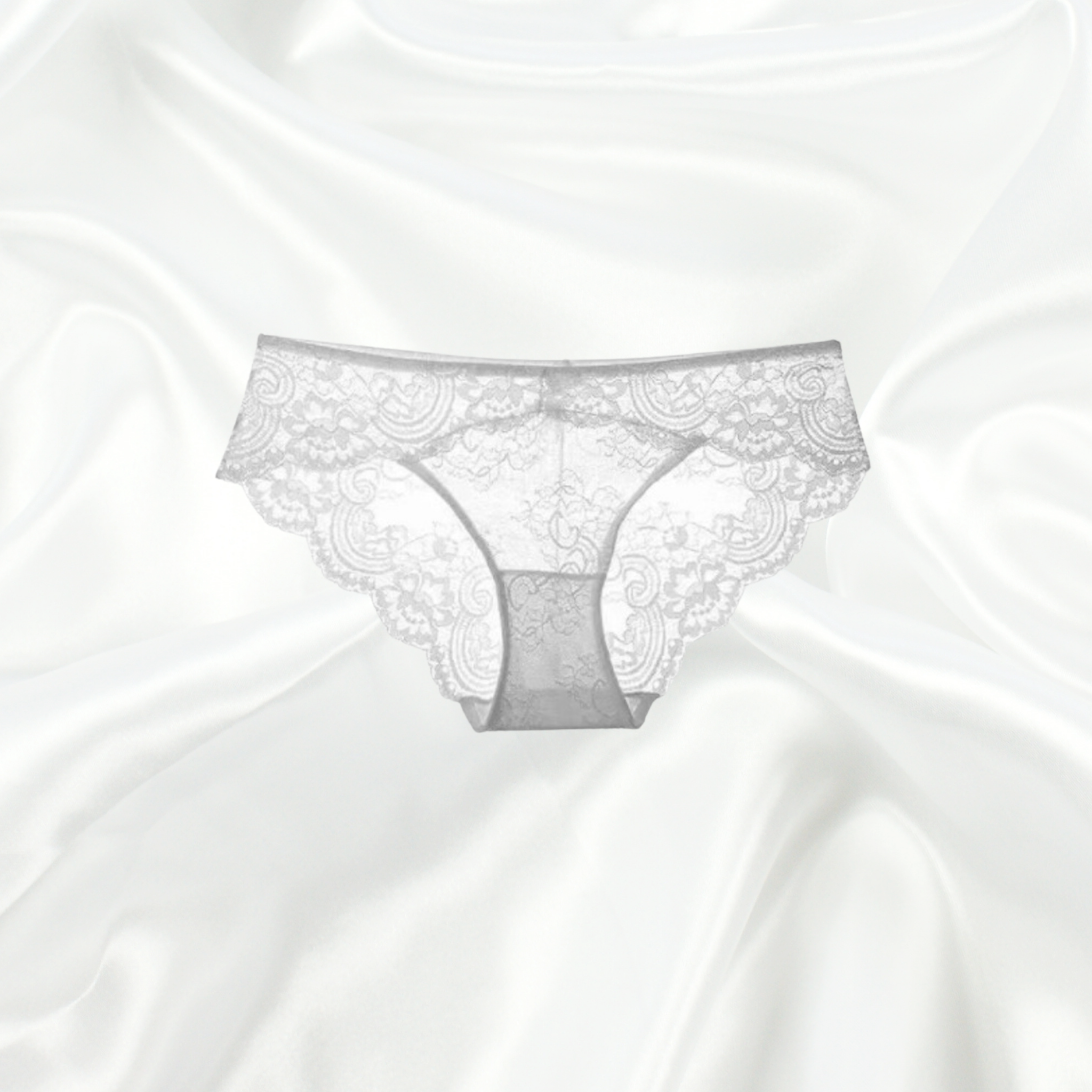 Snowy Queen Lace Brazilian Brief in white floral lace with scalloped edges, a seductive sheer lace back, and soft, breathable fabric for ultimate comfort.