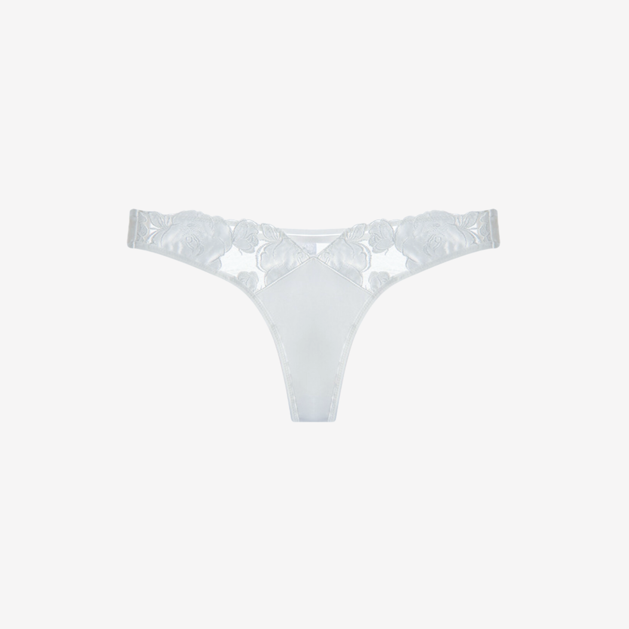 White embroidered hipster thong with sheer lace detailing and delicate floral embroidery. Perfectly matches with demi bra.