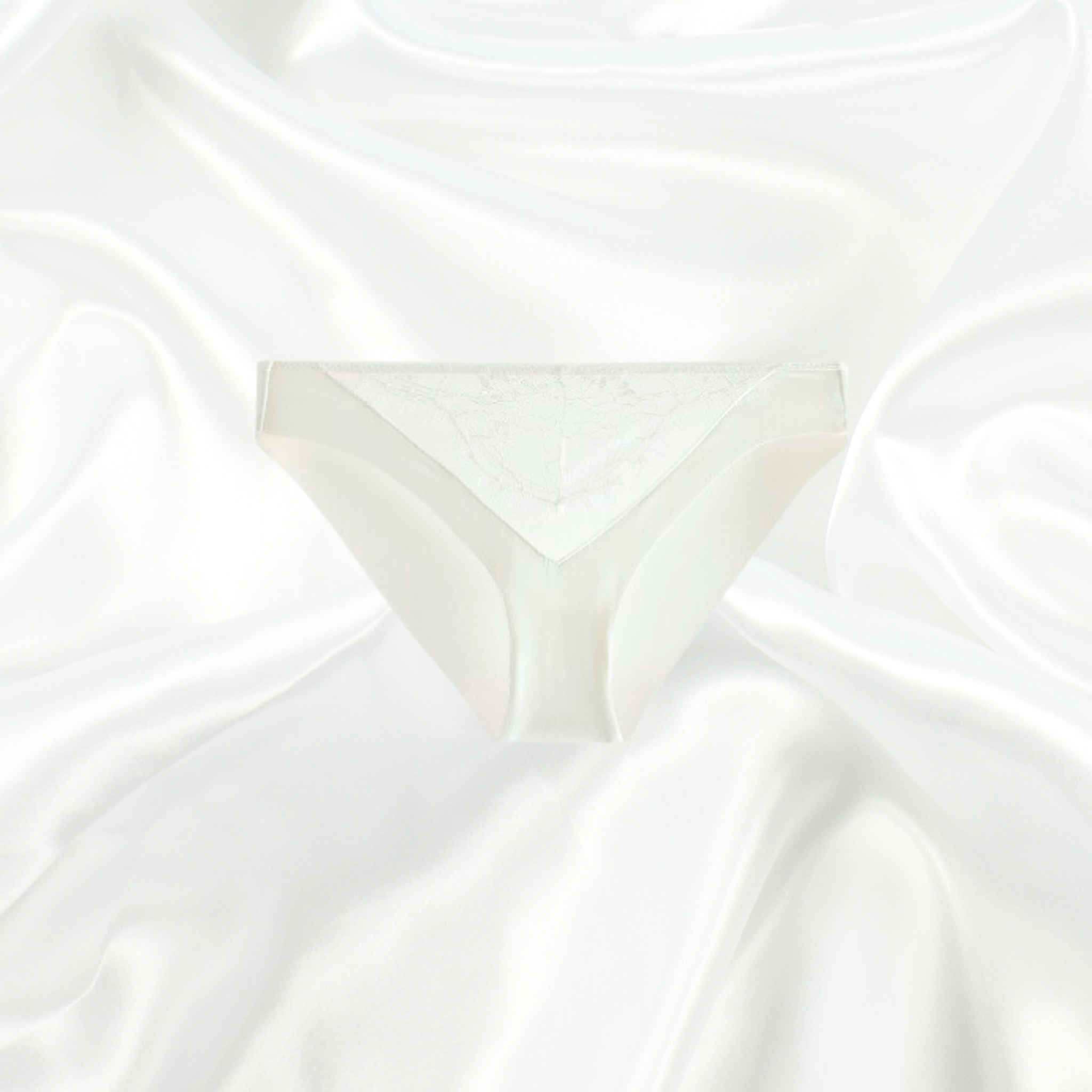 White Lace Bikini by Intyra, crafted from silky-soft fabric with intricate floral lace detailing.