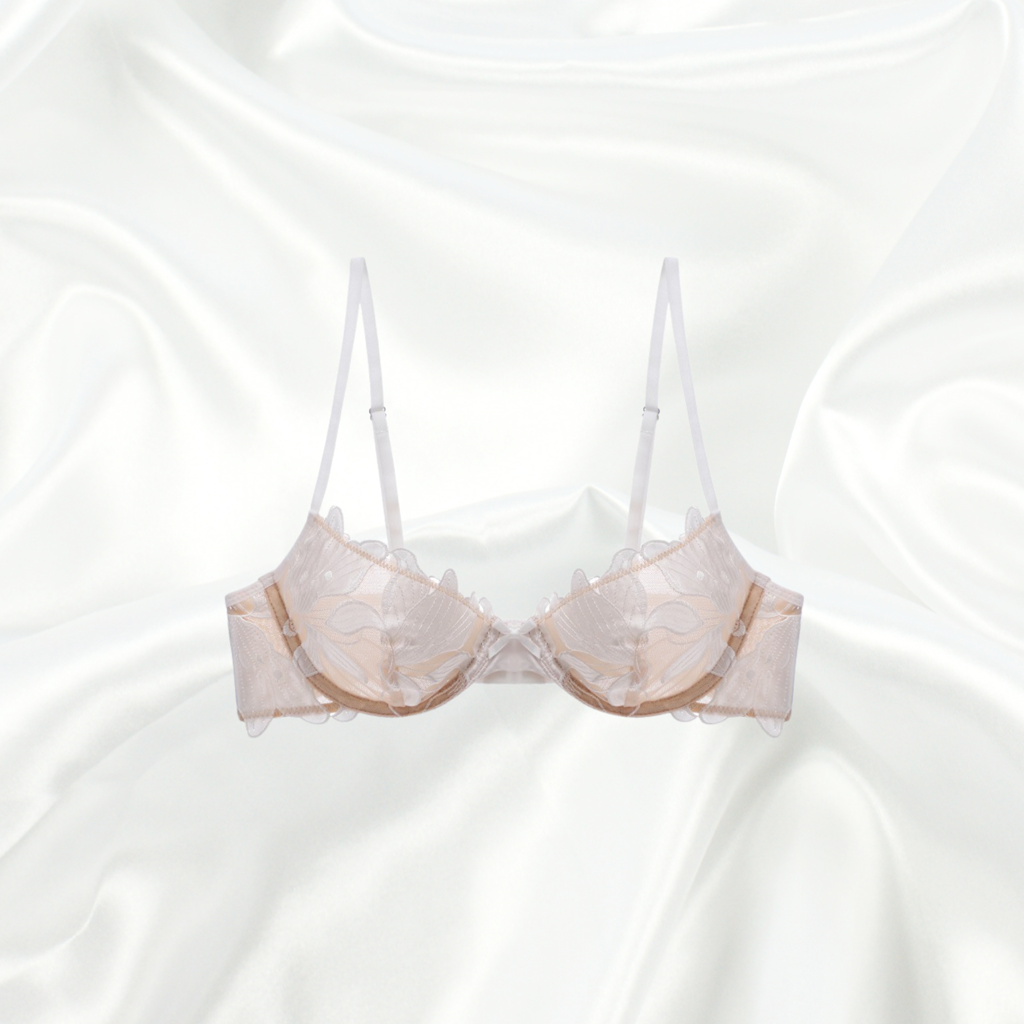 White lace balconette bra with floral embroidery and mesh details – Intyra luxury lingerie.