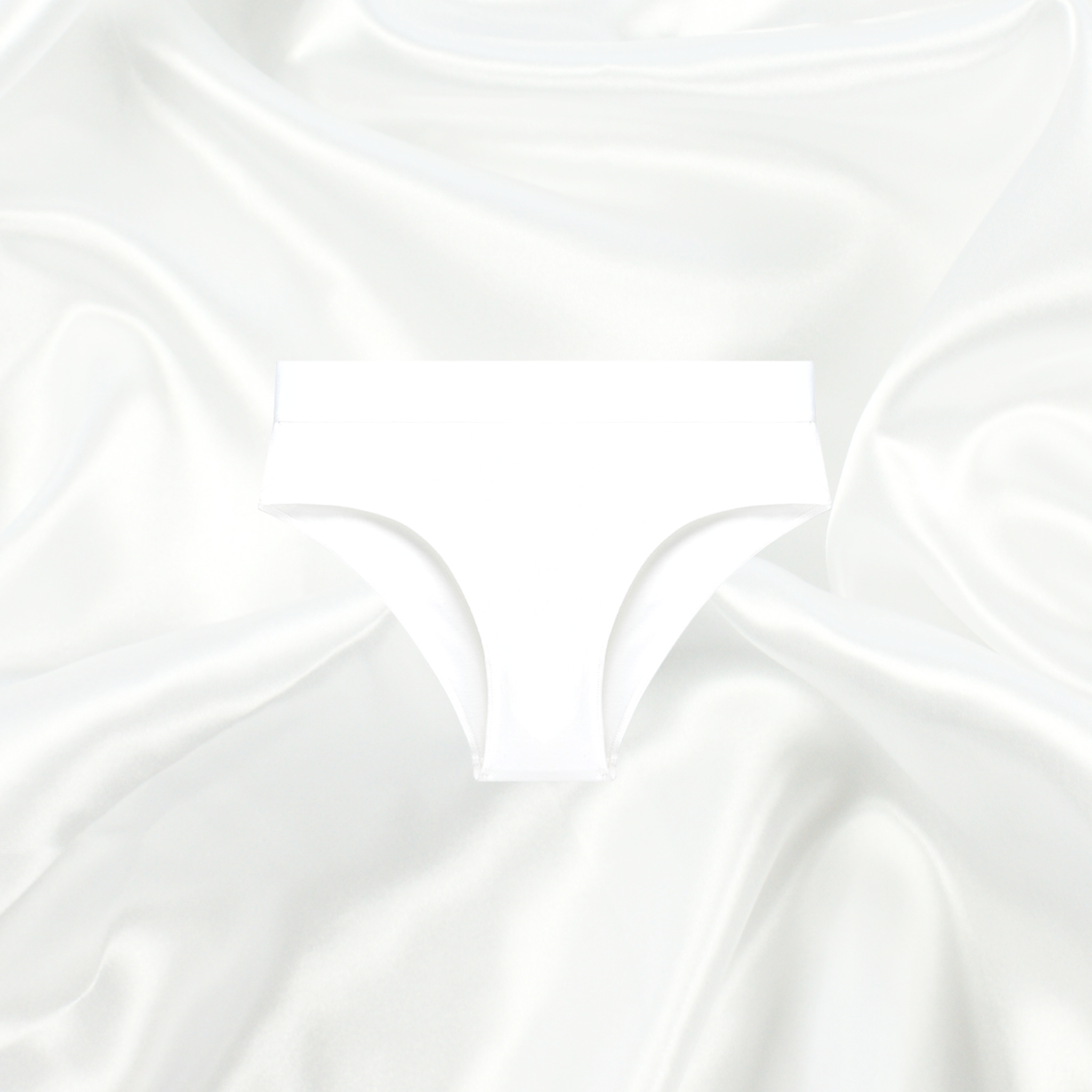 White seamless panty by Intyra, designed for a smooth, invisible fit under clothing, offering ultimate comfort and luxury.