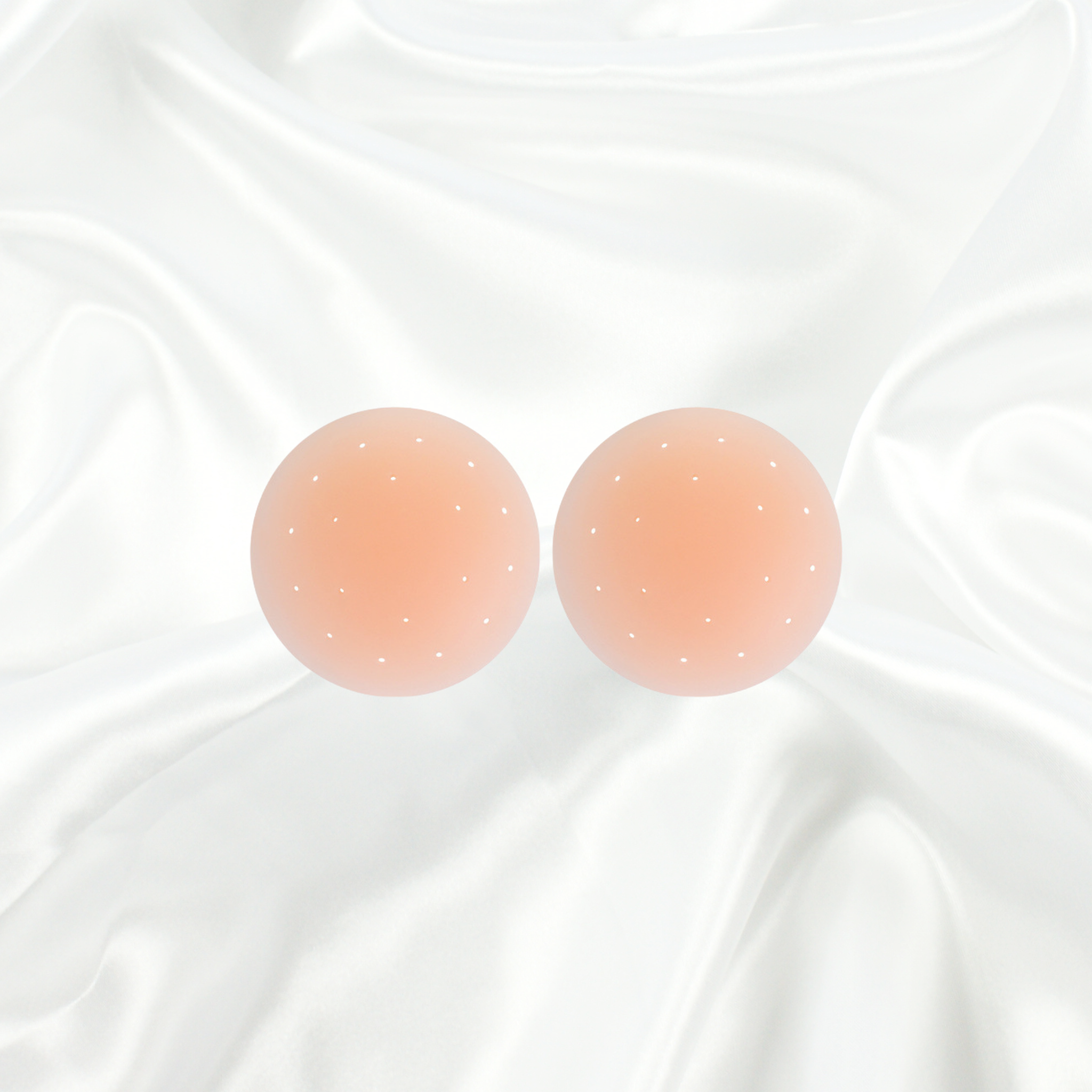 Intyra's luxury nipple covers in soft pink. Our premium adhesive pasties offer seamless coverage, comfort, and confidence under any outfit.