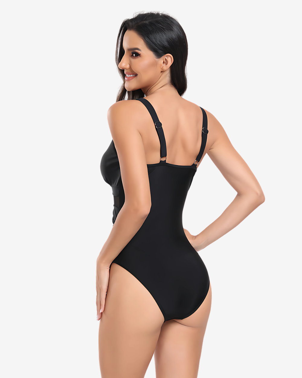 Back view of the Midnight Mirage One-Piece swimsuit featuring elegant black resortwear styling and a sleek feminine silhouette.