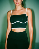 Model Wearing black bralette with white contrast piping detail Front View - Intyra