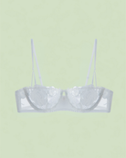 Intyra Ivory Petal Demi Bra in ivory featuring floral embroidery and elegant sheer mesh detailing.