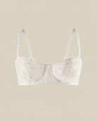 Luxury Intyra Champagne Bliss Ivory Lace Bandeau displayed against an elegant editorial-inspired background.