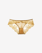 Intyra Golden Veil Lace Brazilian Brief in golden saffron featuring delicate floral lace and elegant sheer detailing on a white background.
