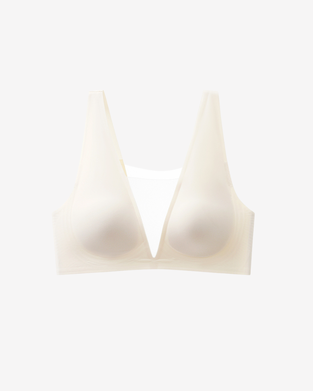 Intyra Ivory Éclat Contour Top in luminous ivory featuring sheer mesh detailing and a sculpted contemporary silhouette on a white background.