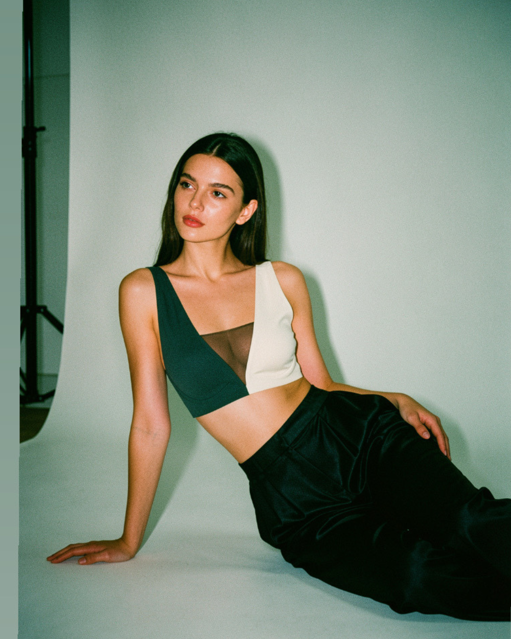 Intyra Model wearing bra top to show dual color paired with formal pants