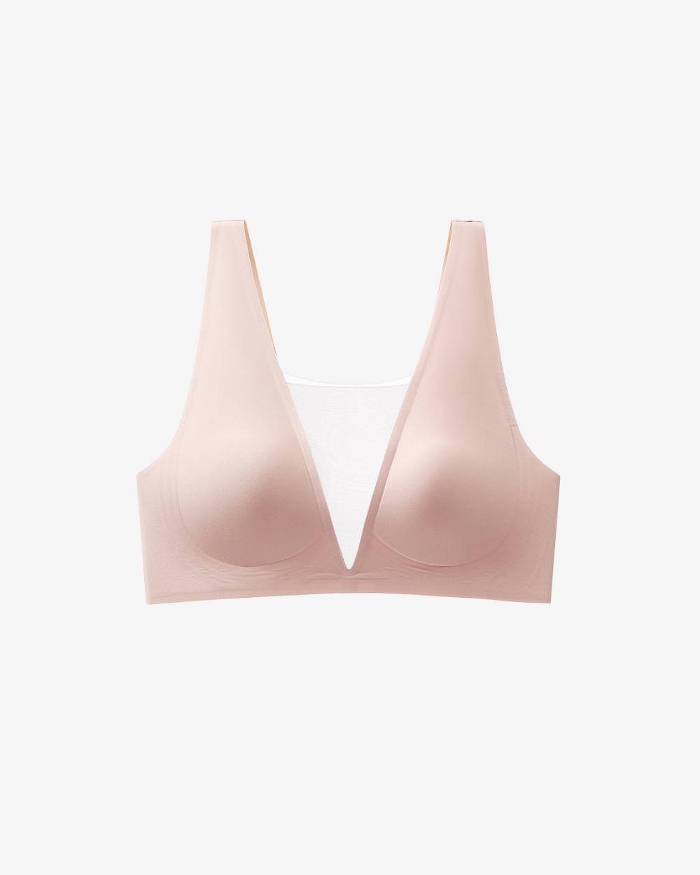 Intyra Lustre Blush Contour Top in soft blush pink featuring sheer mesh detailing and a sculpted contemporary silhouette on a white background.