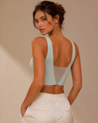 Detailed back view of the Intyra Mist Veil Contour Top highlighting seamless contour shaping and elegant fit.