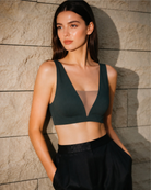 Model styling the Intyra Onyx Allure Contour Top for elevated day-to-night contemporary fashion.