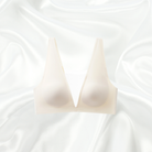 Ivory Corset Top with mesh details and plunging neckline in ivory