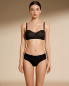 Model wearing the Intyra Midnight Allure Lace Bandeau styled with the matching plain brief