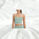 Mint green padded bra top with contrast piping, square neckline, ultra-soft non-wired design, full lining, and adjustable straps for stylish and versatile wear.