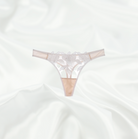 Scalloped-edge nude white lace panty matching with sheer lace bra for a luxurious lingerie set.