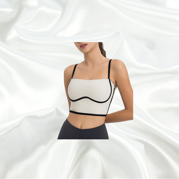 Ultra-soft padded white square-neck bra top with black contrast piping, non-wired design, full lining, and adjustable straps for a stylish and versatile fit.