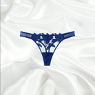 Scalloped-edge royal blue lace panty matching with sheer lace bra for a luxurious lingerie set.