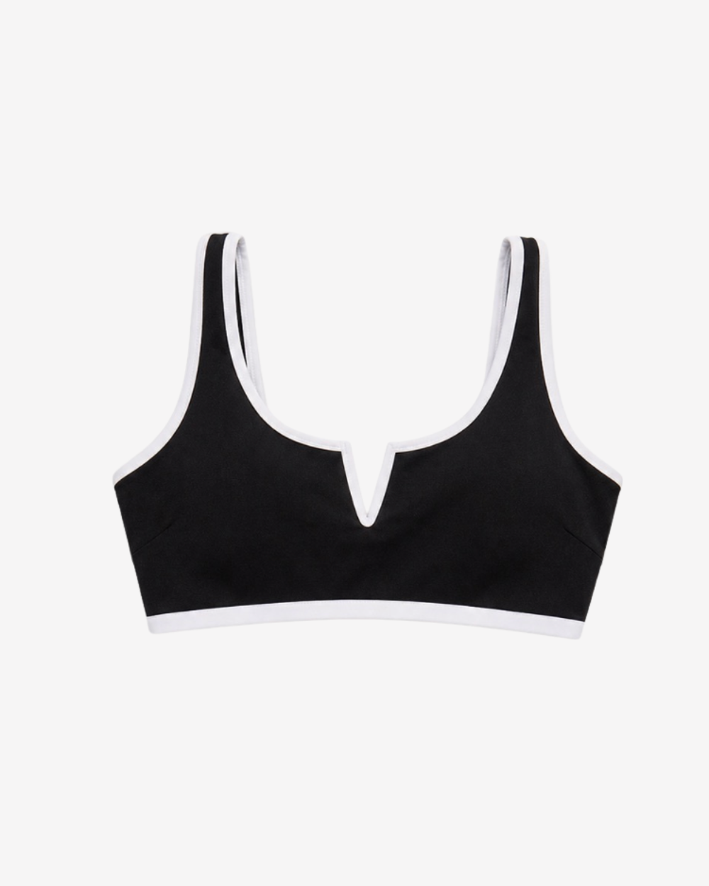 Iconic Riviera Black Bikini Top featuring a statement V-notch neckline and elegant white contrast trim on a white background.
