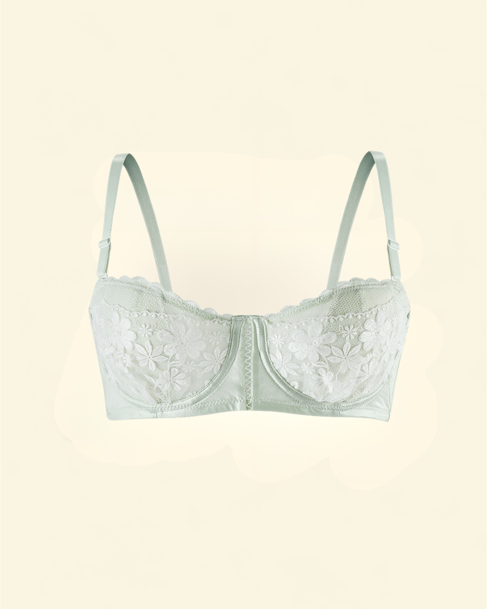Luxury Intyra Mint Serenity floral lace bra in soft mint green displayed against an elegant coloured background.