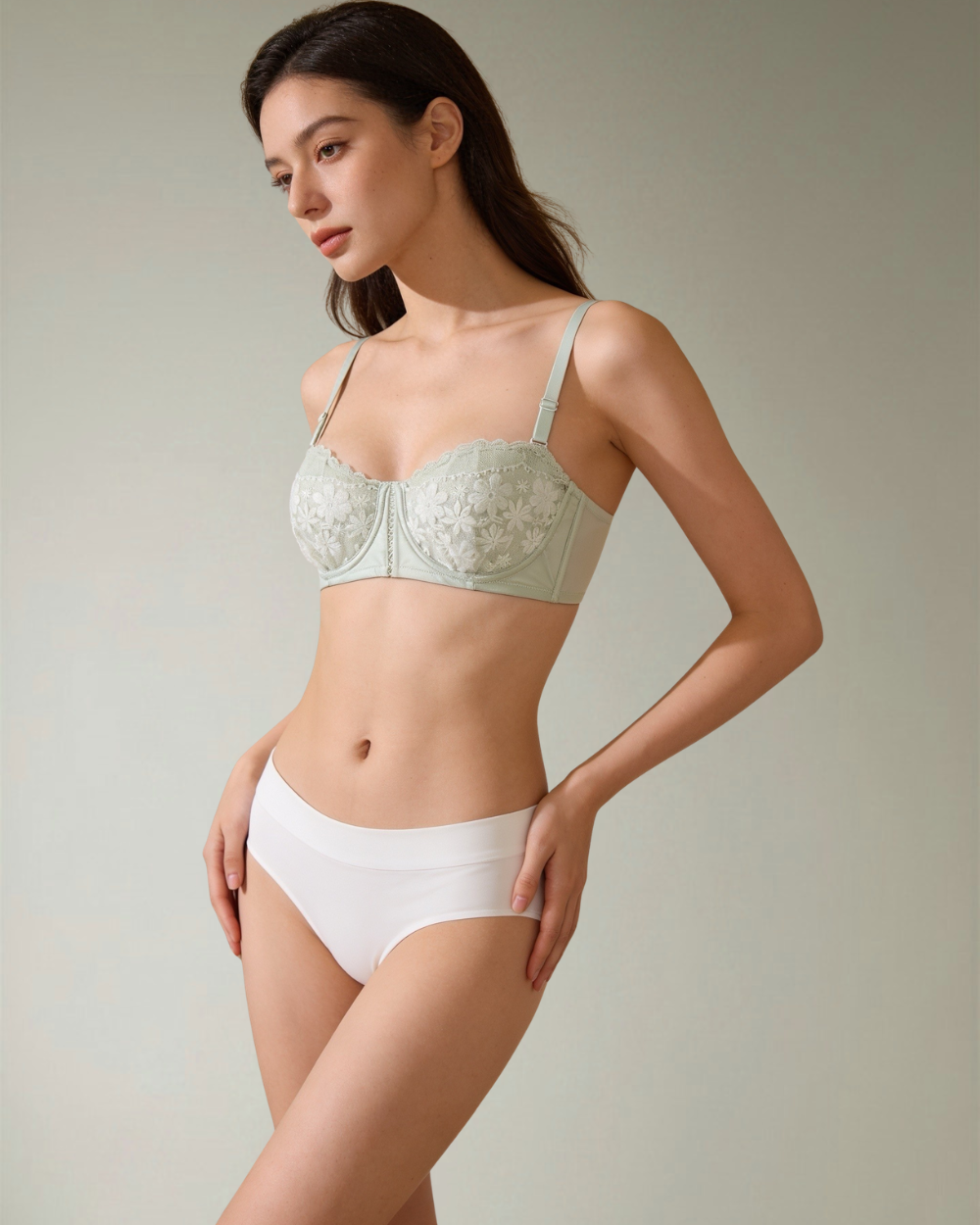 Side view of the Intyra Mint Serenity Lace Bandeau showcasing floral lace detailing, sculpted fit, and elegant mint green design.