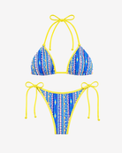 Close-up of the vibrant blue and yellow print detailing on the Lumia Sunset Bikini Set.