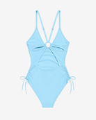 Back view of the Skyline Tranquility One-Piece Swimsuit featuring an elegant open-back design with ring detailing and adjustable straps on white plain background
